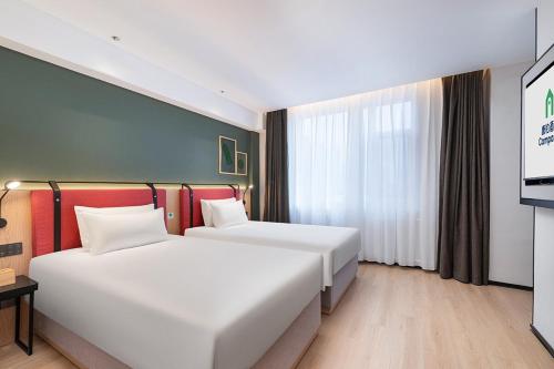 Imagen general del Hotel Campanile Liaocheng Bus Terminal Wanda Plaza. Foto 7