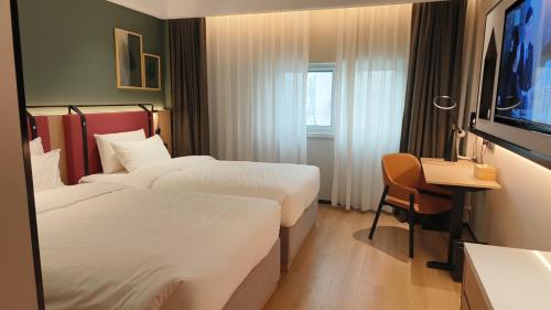 Imagen general del Hotel Campanile Liaocheng Bus Terminal Wanda Plaza. Foto 10