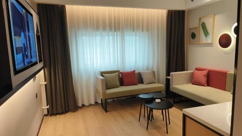 Imagen general del Hotel Campanile Liaocheng Bus Terminal Wanda Plaza. Foto 16