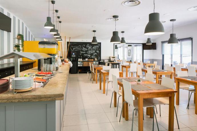 Imagen del bar/restaurante del Hotel Campanile Lisbon South - Setubal. Foto 6