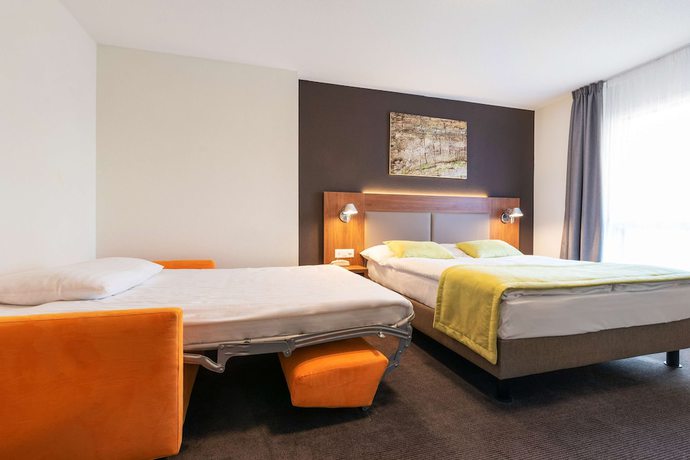 Imagen de la habitación del Hotel Campanile Martigny. Foto 7