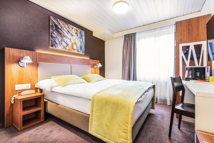 Imagen de la habitación del Hotel Campanile Martigny. Foto 13