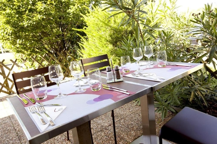 Imagen del bar/restaurante del Hotel Campanile NATURE - Strasbourg Sud Geispolsheim. Foto 4