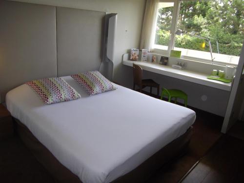 Imagen de la habitación del Hotel Campanile NATURE - Villennes sur Seine Poissy. Foto 20