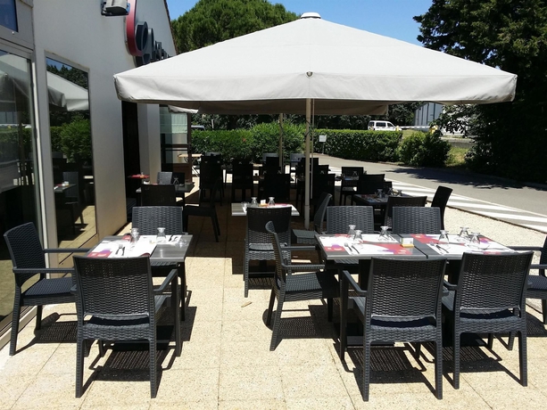 Imagen del bar/restaurante del Hotel Campanile Orange. Foto 4