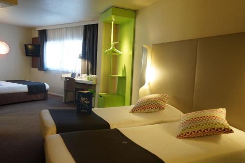 Imagen de la habitación del Hotel Campanile PRIME - Roissy - A&eacute;roport Paris CDG. Foto 20