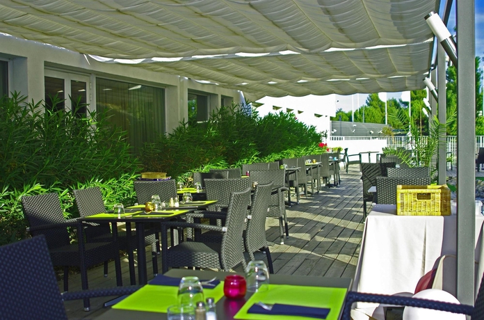 Imagen del bar/restaurante del Hotel Campanile Prime Montpellier Ouest - Croix d'Argent. Foto 5