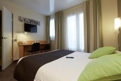 Imagen de la habitación del Hotel Campanile Prime - Paris 14 Maine Montparnasse. Foto 20
