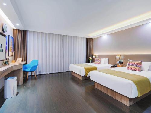 Imagen de la habitación del Hotel Campanile Yangzhou China Grand Canal & Ho Family Garden. Foto 12