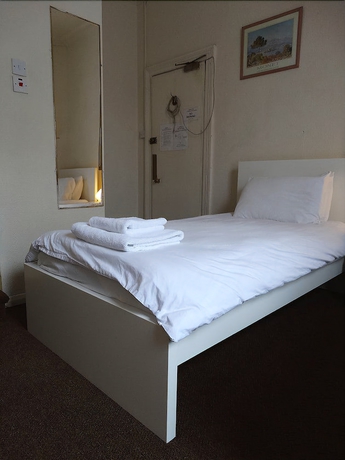 Imagen de la habitación del Hotel Campbell's Guest House. Foto 6