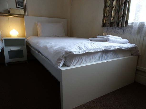 Imagen de la habitación del Hotel Campbell's Guest House. Foto 9