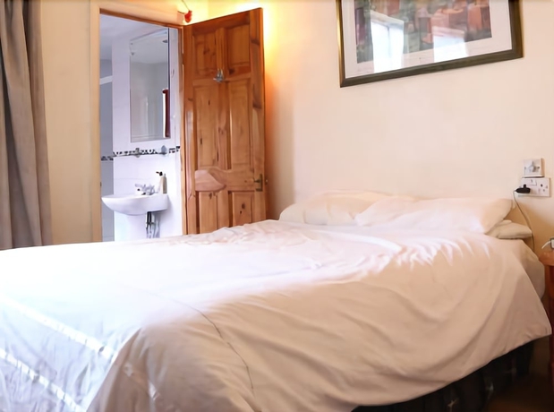 Imagen de la habitación del Hotel Campbell's Guest House. Foto 10