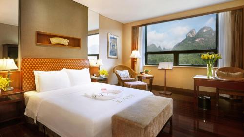 Imagen de la habitación del Hotel C&d Resort,wuyi Mountain. Foto 3