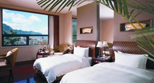 Imagen de la habitación del Hotel C&d Resort,wuyi Mountain. Foto 4
