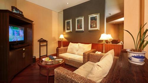 Imagen de la habitación del Hotel C&d Resort,wuyi Mountain. Foto 5