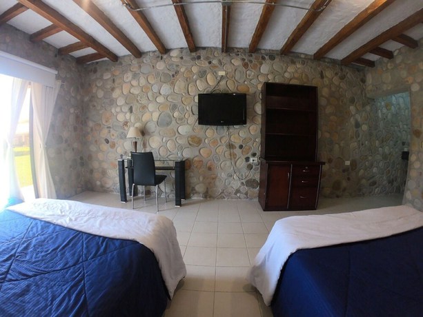 Imagen de la habitación del Hotel Campestre Aguamaco. Foto 16