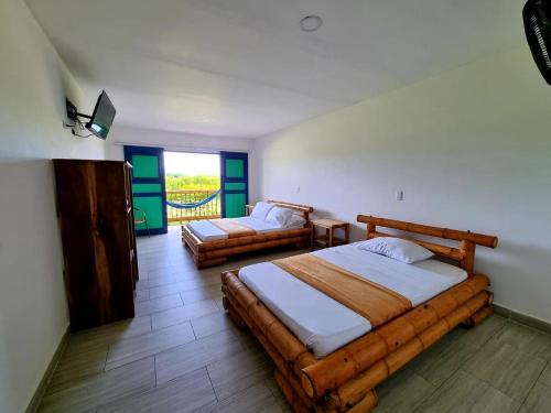 Imagen de la habitación del Hotel Campestre Caf&eacute; Tropical. Foto 14