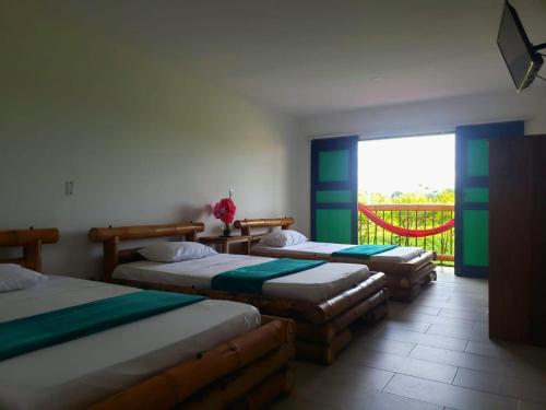 Imagen de la habitación del Hotel Campestre Caf&eacute; Tropical. Foto 15