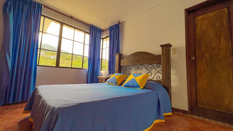 Imagen de la habitación del Hotel Campestre El Molino Dapa Cali. Foto 3