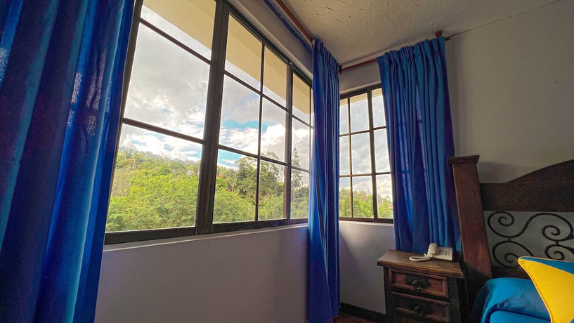Imagen de la habitación del Hotel Campestre El Molino Dapa Cali. Foto 9
