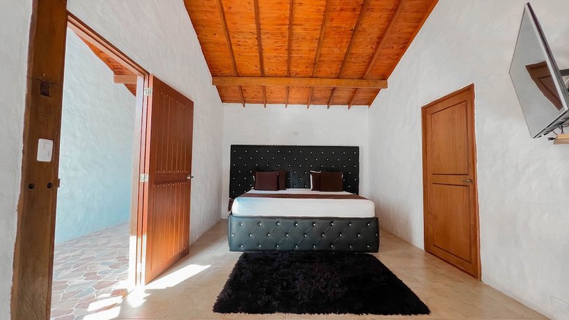 Imagen de la habitación del Hotel Campestre El Molino Dapa Cali. Foto 11