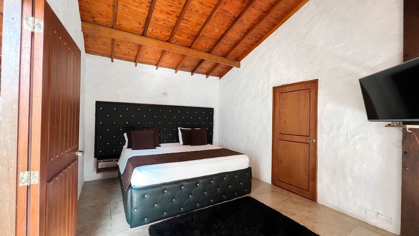 Imagen de la habitación del Hotel Campestre El Molino Dapa Cali. Foto 14