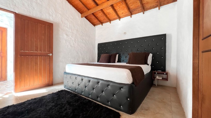 Imagen de la habitación del Hotel Campestre El Molino Dapa Cali. Foto 16