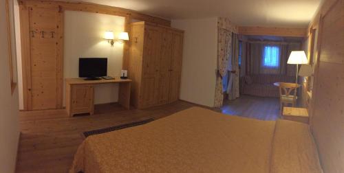 Imagen de la habitación del Hotel Campiglio Bellavista. Foto 7