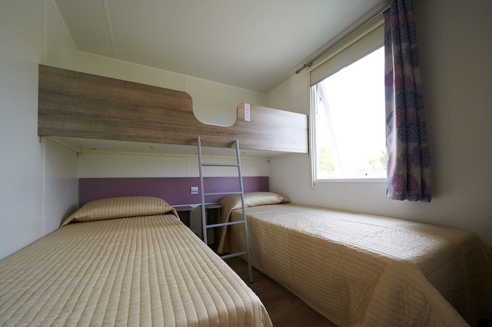 Imagen de la habitación del Hotel Camping Baia Verde. Foto 5