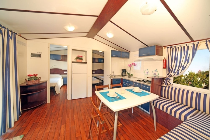 Imagen de la habitación del Hotel Camping Baia Verde. Foto 8