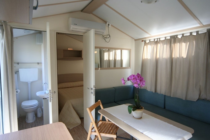 Imagen de la habitación del Hotel Camping Baia Verde. Foto 10