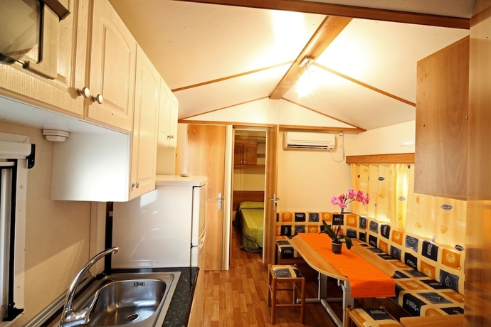 Imagen de la habitación del Hotel Camping Baia Verde. Foto 12