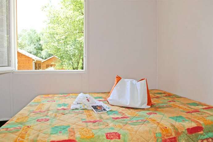 Imagen de la habitación del Hotel Camping Domaine Du Petit Lac. Foto 18