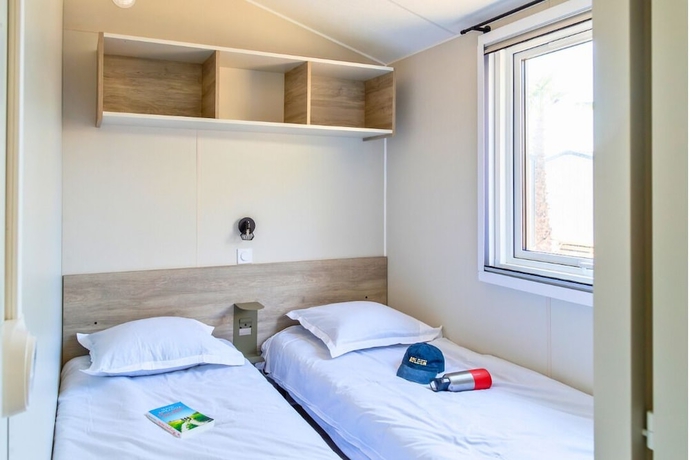 Imagen de la habitación del Hotel Camping Domaine des Tamaris. Foto 14