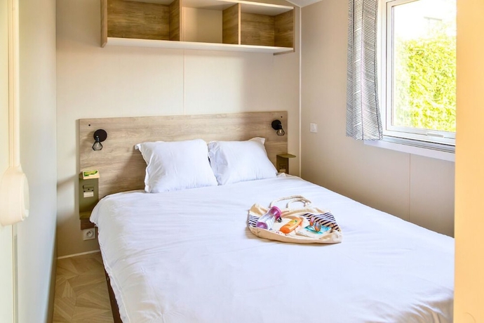 Imagen de la habitación del Hotel Camping Domaine des Tamaris. Foto 15