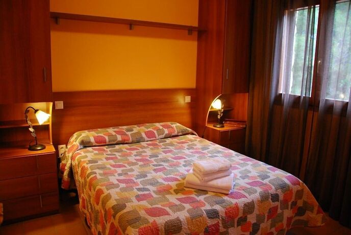 Imagen de la habitación del Hotel Camping El Roble. Foto 13