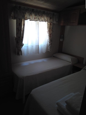 Imagen de la habitación del Hotel Camping Fuentes Blancas. Foto 5