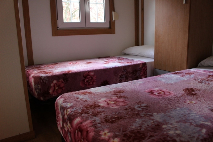 Imagen de la habitación del Hotel Camping Fuentes Blancas. Foto 9