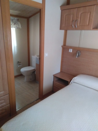 Imagen de la habitación del Hotel Camping Fuentes Blancas. Foto 12
