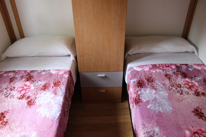 Imagen de la habitación del Hotel Camping Fuentes Blancas. Foto 14