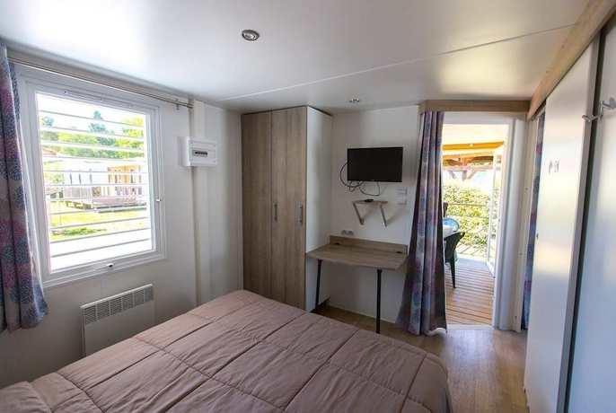 Imagen de la habitación del Hotel Camping La Palmyre Estanquet. Foto 3