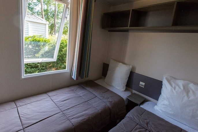 Imagen de la habitación del Hotel Camping La Palmyre Estanquet. Foto 4