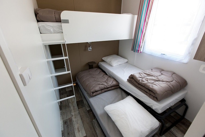 Imagen de la habitación del Hotel Camping La Palmyre Estanquet. Foto 6