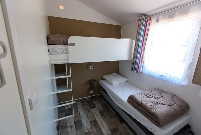 Imagen de la habitación del Hotel Camping La Palmyre Estanquet. Foto 7
