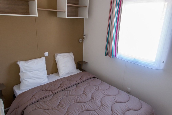 Imagen de la habitación del Hotel Camping La Palmyre Estanquet. Foto 8