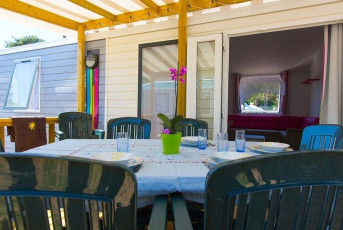 Imagen de la habitación del Hotel Camping La Palmyre Estanquet. Foto 12