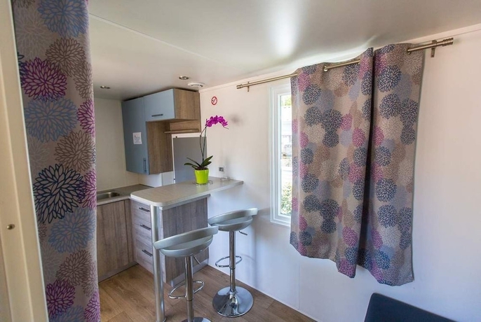 Imagen de la habitación del Hotel Camping La Palmyre Estanquet. Foto 13