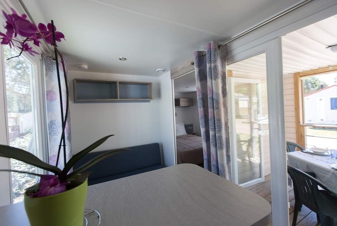 Imagen de la habitación del Hotel Camping La Palmyre Estanquet. Foto 15