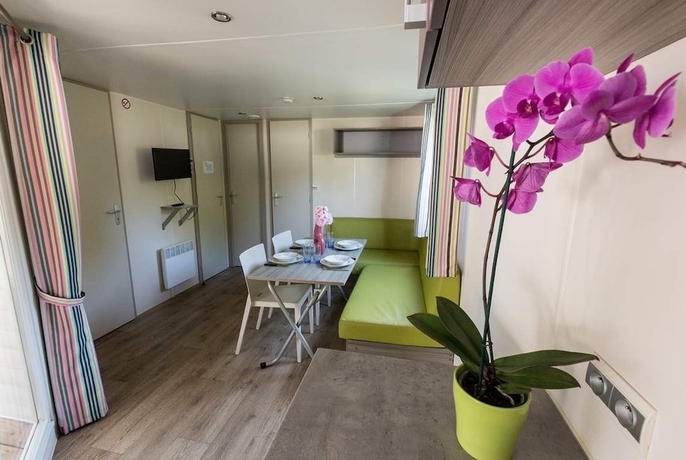 Imagen de la habitación del Hotel Camping La Palmyre Estanquet. Foto 16