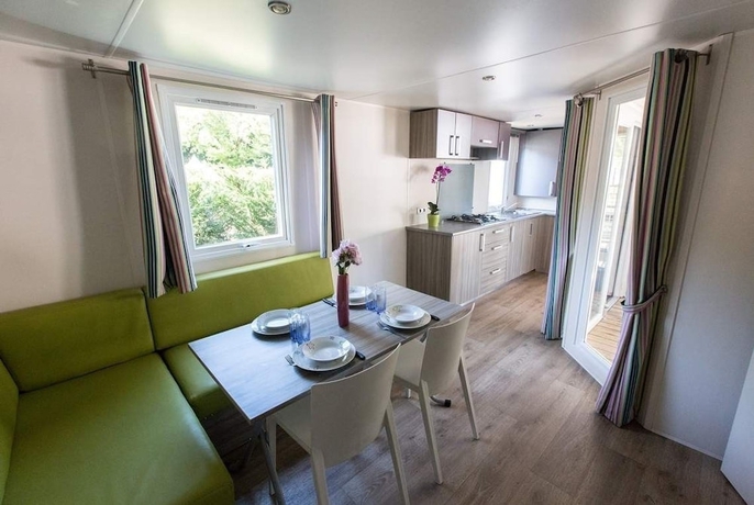 Imagen de la habitación del Hotel Camping La Palmyre Estanquet. Foto 17